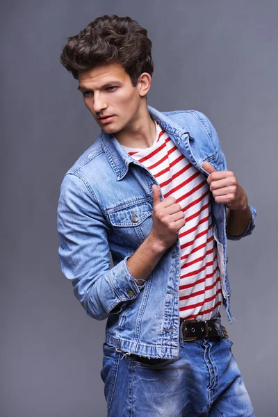 Male fashion model with modern haircut — Stock Photo, Image