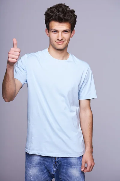 Handsome man in blank blue t-shirt — Stock Photo, Image