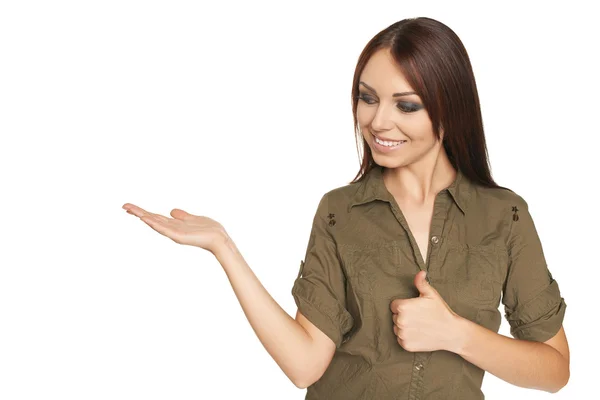 Förvånad ung kvinna visar öppen hand palm — Stockfoto