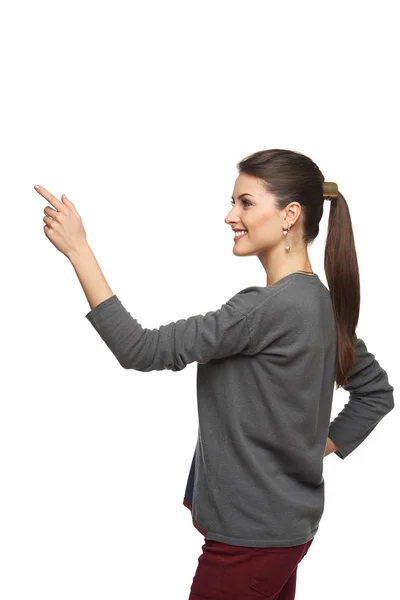 Vista lateral de la mujer apuntando al espacio de copia —  Fotos de Stock