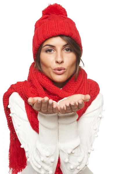 Winter woman blowing a kiss — Stock Photo, Image