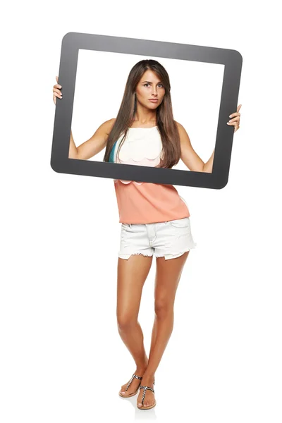 Woman looking through frame — Stock Photo, Image