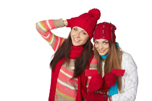 Two winter girls showing blank cards — Stock Photo, Image