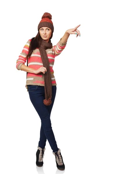 Winter woman pointing at copy space — Stock Photo, Image