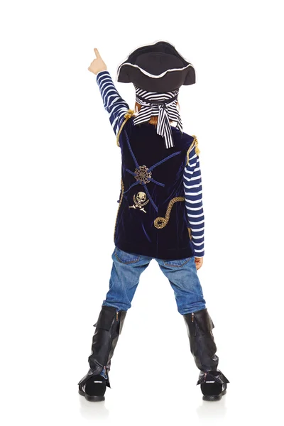 Bakifrån av pojke pirat pekar uppåt — Stockfoto