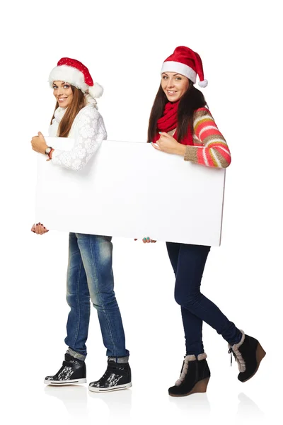 Two winter females with banner — Stock Photo, Image