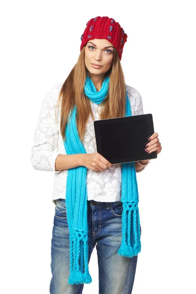 Winter woman showing tablet screen — Stock Photo, Image