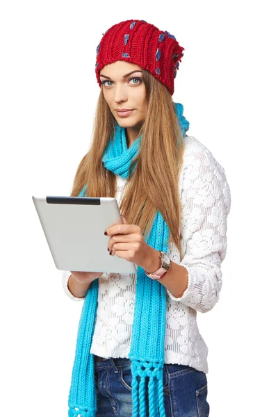 Winter woman showing tablet screen — Stock Photo, Image