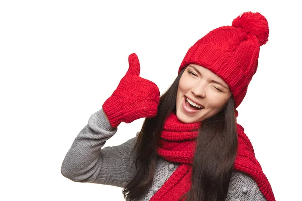 Mujer de invierno pulgar hacia arriba — Foto de Stock