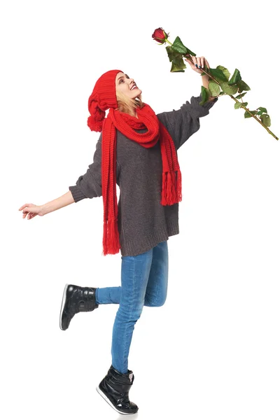 Beautiful woman holding red rose — Stock Photo, Image