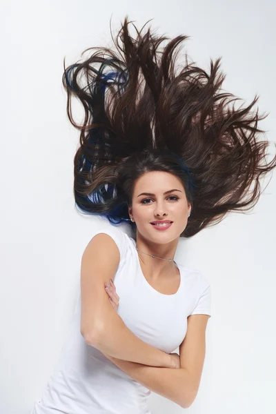 Top view of  woman lying on floor on back — Stock Photo, Image