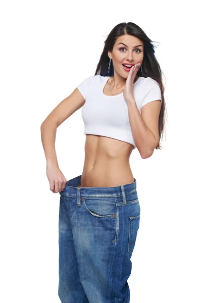 Young woman delighted with her dieting results Royalty Free Stock Images