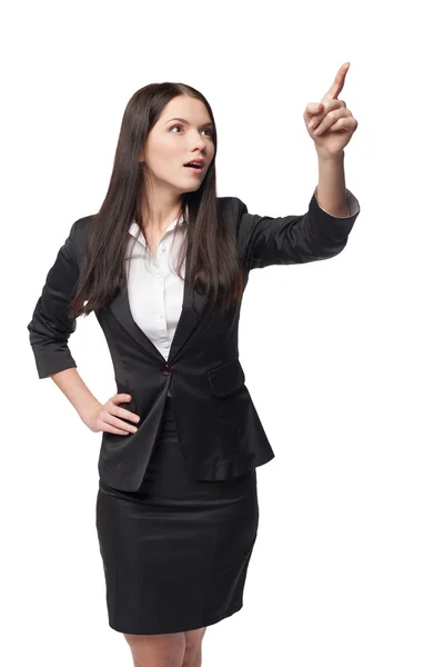 Mujer de negocios señalando espacio de copia en blanco — Foto de Stock