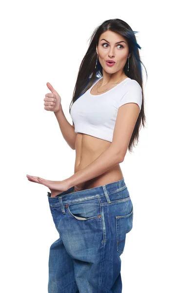 Junge Frau erfreut über ihre Diätergebnisse — Stockfoto