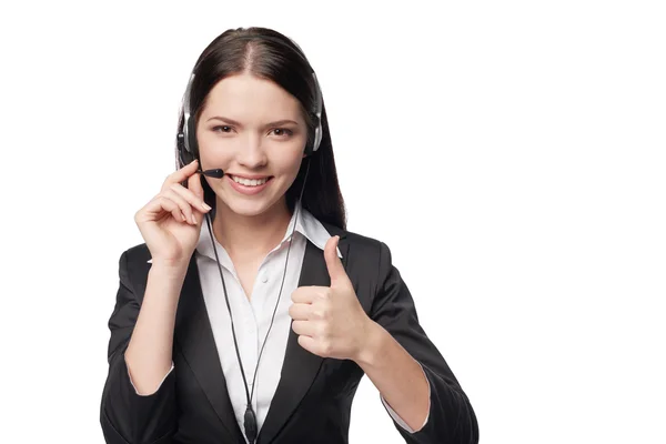 Mujer atractiva sonriente con auriculares — Foto de Stock