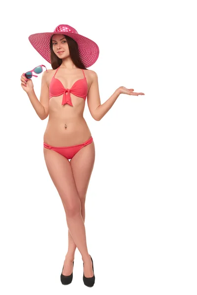 Mulher de fato de banho rosa e chapéu — Fotografia de Stock