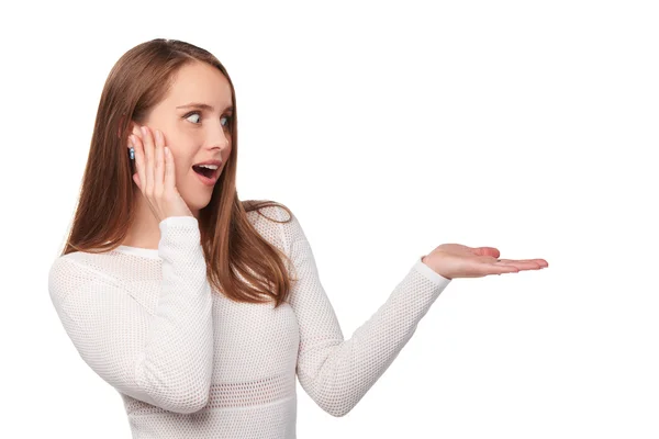 Surprised woman showing open hand palm — Stock Photo, Image