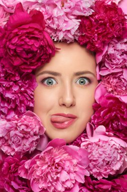 Woman face in peony flowers clipart