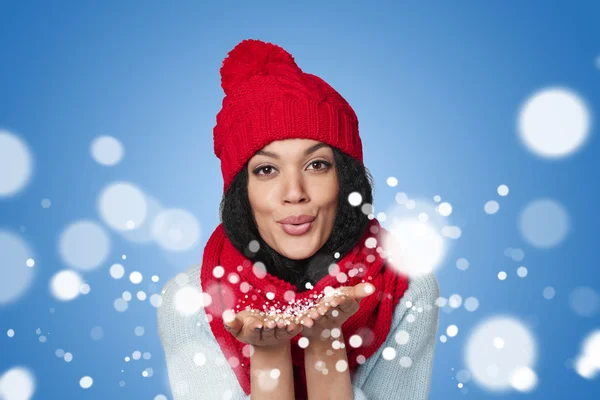 Winter girl blowing snow at you — Stock Photo, Image