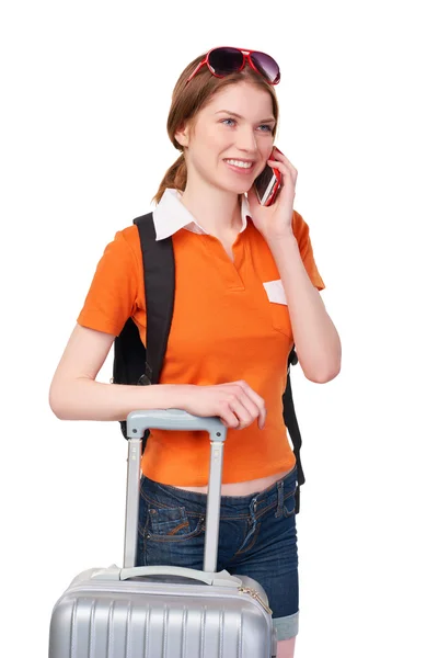 Chica sonriente con mochila y maleta — Foto de Stock