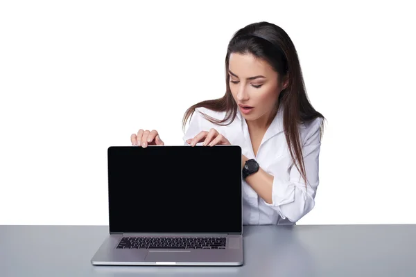 Business woman showing black laptop screen — Stock Photo, Image