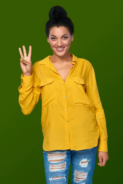 Woman showing three fingers — Stock Photo, Image