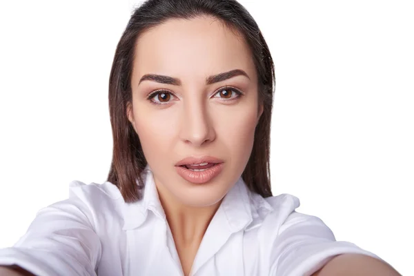 Closeup portrait of young woman taking selfie — Stok fotoğraf