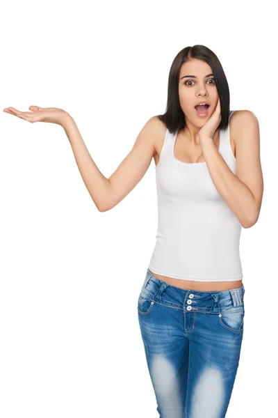 Smiling teen girl showing open hand palm with copy space — Stok fotoğraf