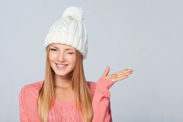 Winter woman winking at you — Stock Photo, Image