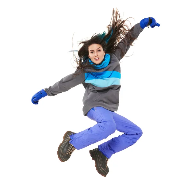 Mulher de inverno pulando — Fotografia de Stock