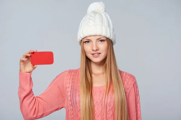 Woman wearing woolen hat and sweater — Stock Photo, Image