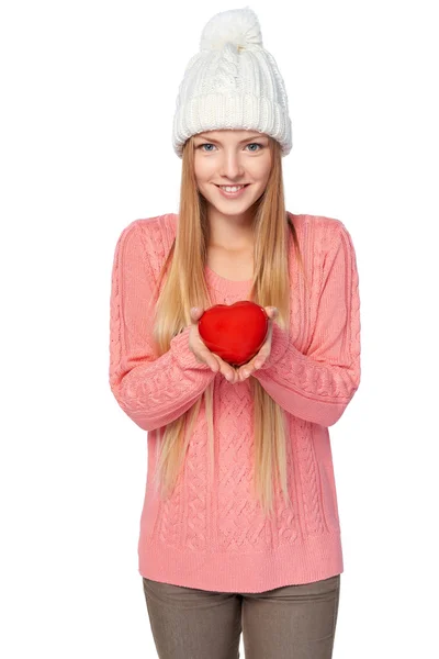 Smiling female showing heart shape — Stock Photo, Image