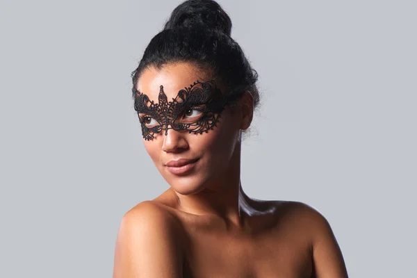 Closeup portrait of beautiful mixed race with black lace mask — Stock Photo, Image
