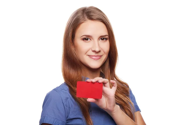 Confident business woman in glasses showing blank credit card — Stock Photo, Image