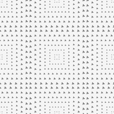 Perforated paper with squares textured with triangles