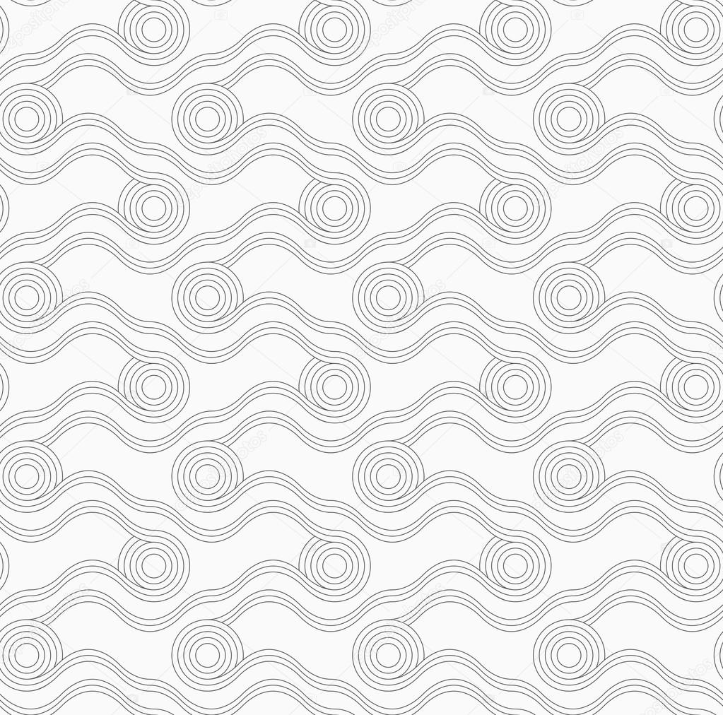 Gray circles with wavy lines in grid