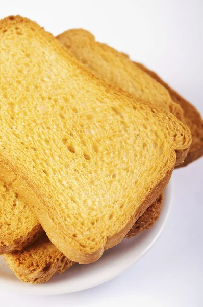 Toasted bread slices for breakfast isolated on white studio background. — Stock Photo, Image