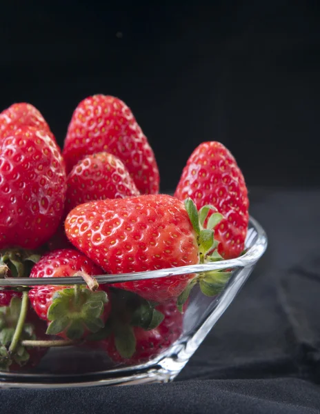 Strawberries in a glass bowl — Stock Photo, Image