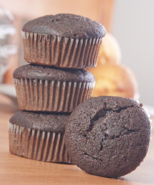 Chocolate muffins with crispy top (selective focus)