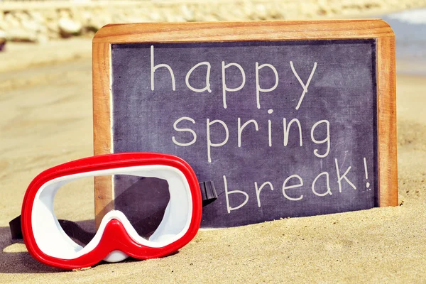 Diving mask and text happy spring break in a chalkboard — Stock Photo, Image