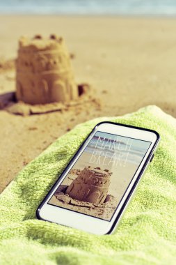 picture of a sandcastle and text march break in a smartphone clipart