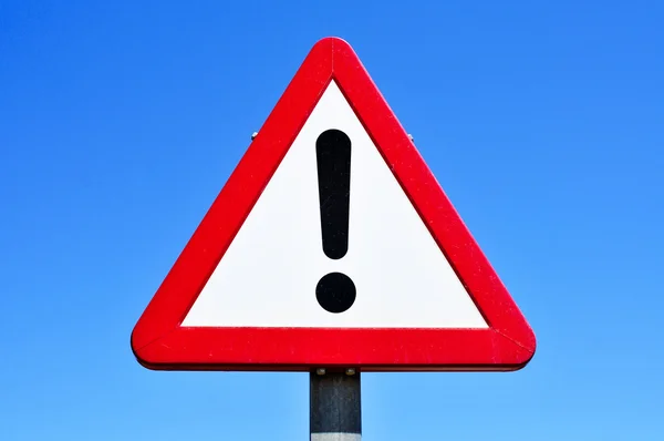 Triangular traffic sign with an exclamation mark — Stock Photo, Image