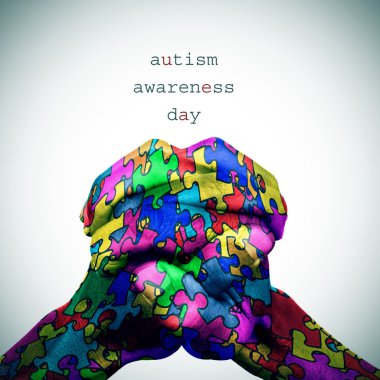 Bulmaca desenli el ve metin otizm farkındalık günü