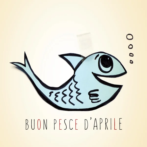 Text buon pesce d 'aprile, happy april douls day in Faban — стоковое фото