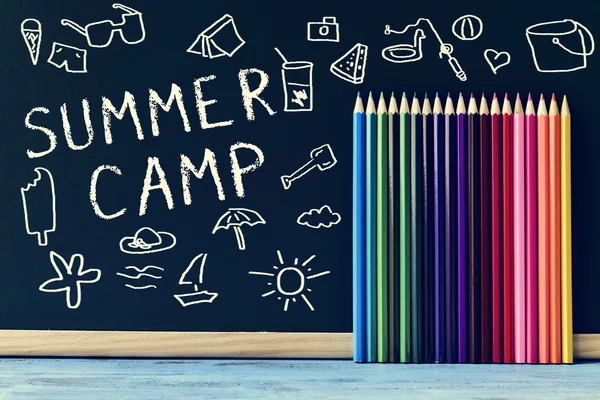 Text summer camp written in a chalkboard — Stock Photo, Image