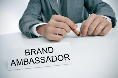 man and name plate with the text brand ambassador clipart