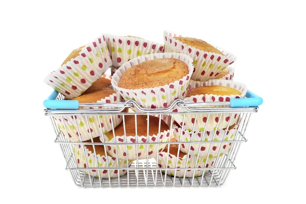 Plain muffins in a shopping basket — Stock Photo, Image