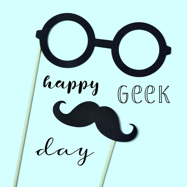 Eyeglasses, mustache and text happy geek pride — Stock Photo, Image