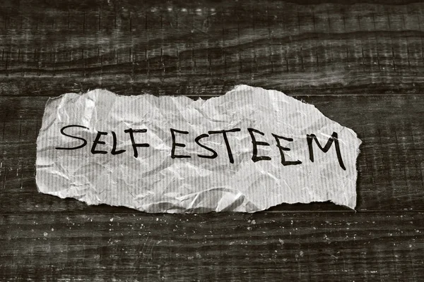 Text self esteem written in a piece of paper — Stock Photo, Image