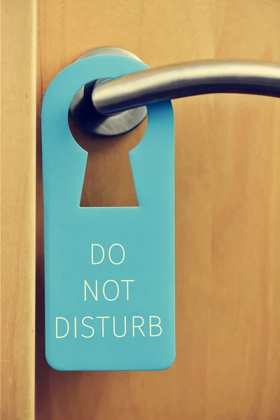 Text do not disturb in a door hanger — Stock Photo, Image